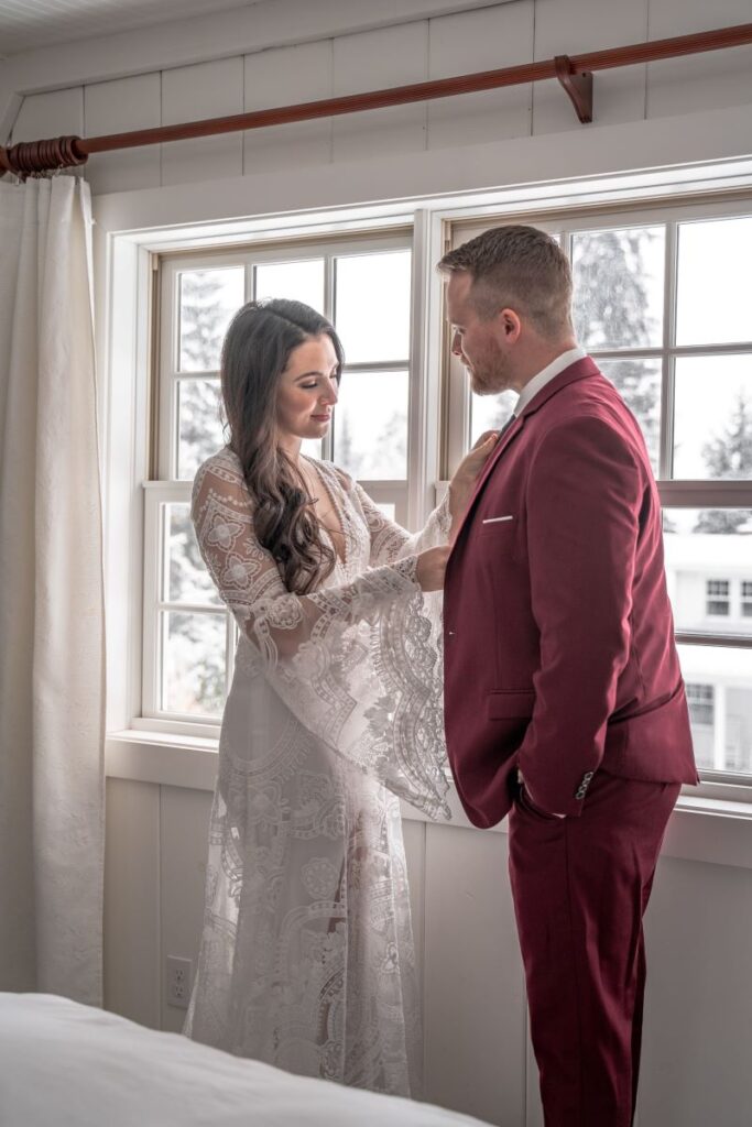 bride and groom getting ready for a frame cabin elopement in Oregon